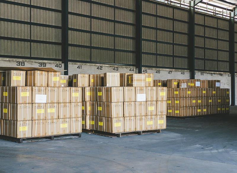 Numbered pallets of boxes in a distribution warehouse